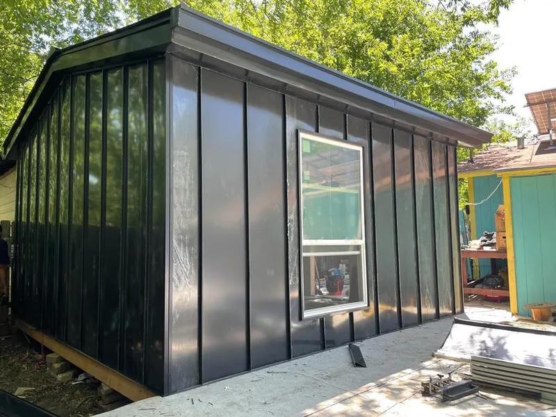 Black standing seam metal wall panels for Roof Inspection in Canterbury