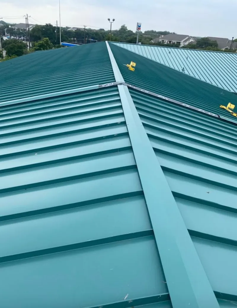 Green commercial metal roof ridge and valley for Metal Roof Repair in Canterbury